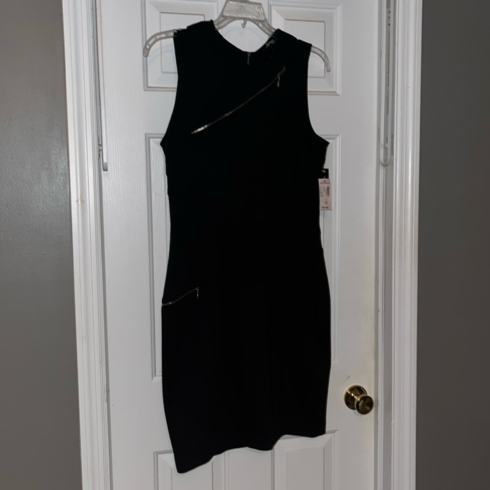 Black zipper knee length dress, never worker worn, with tags